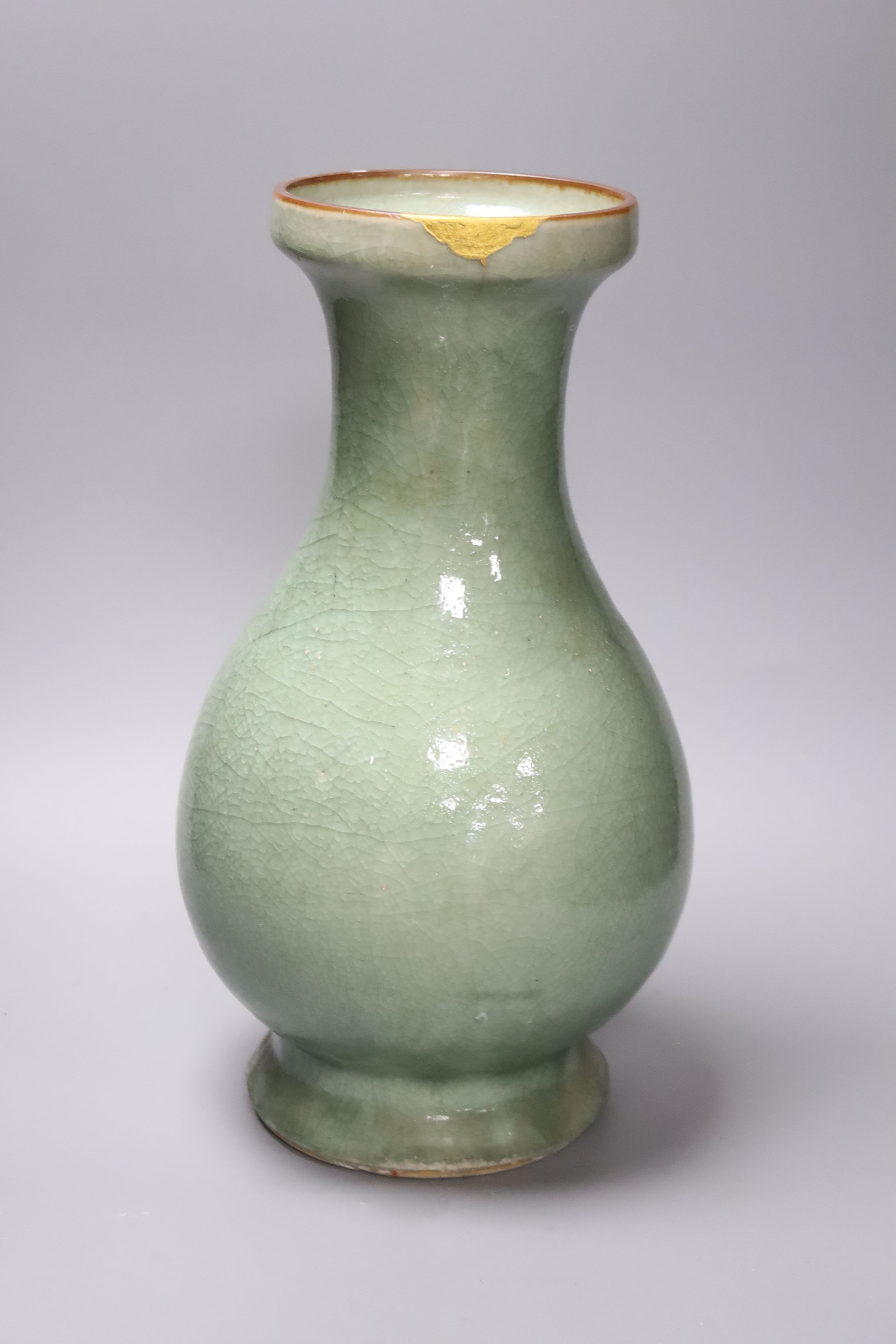 A Chinese celadon crackleglaze vase, probably 17th century or earlier, height 38cm